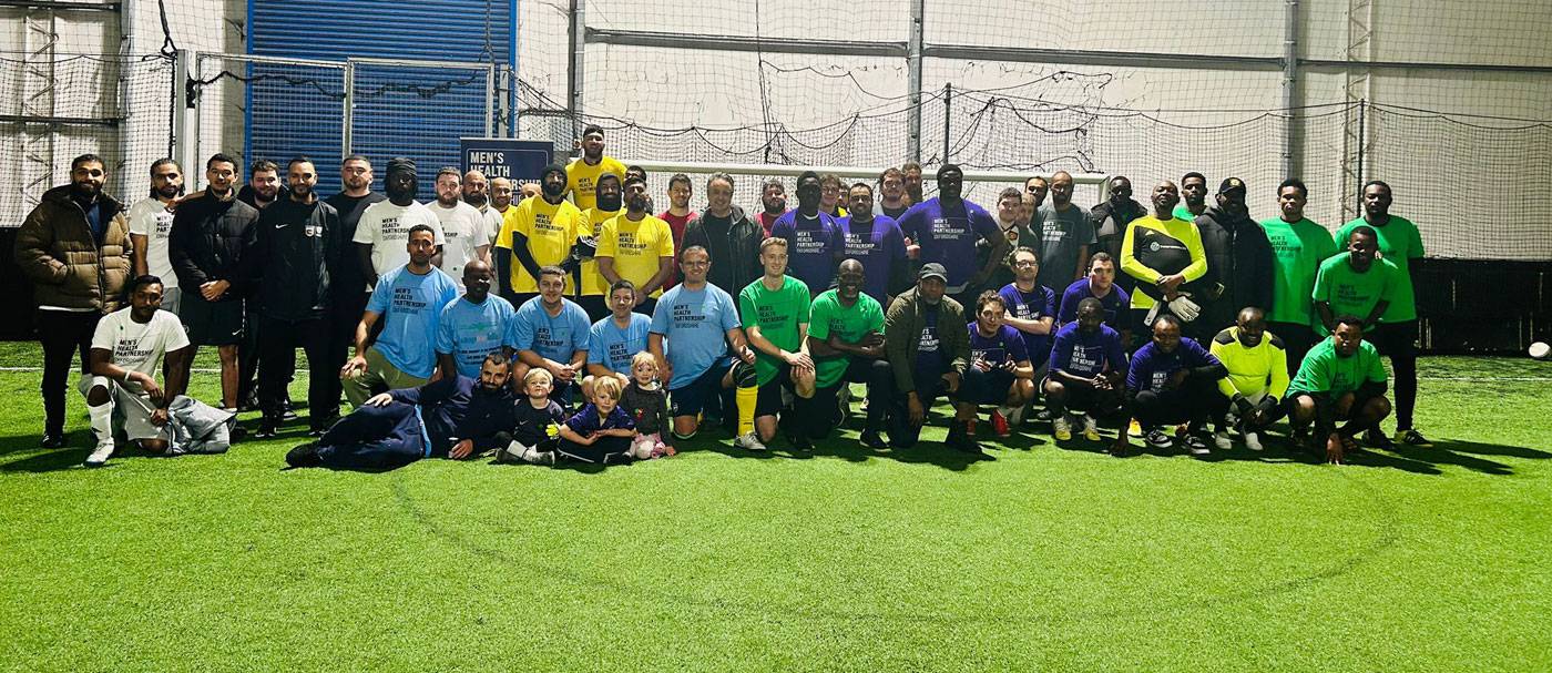 Players taking part in men's health football tournament